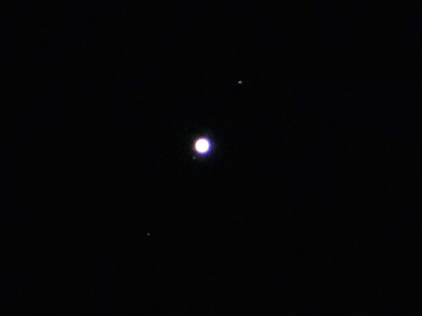 Jupiter and three moons